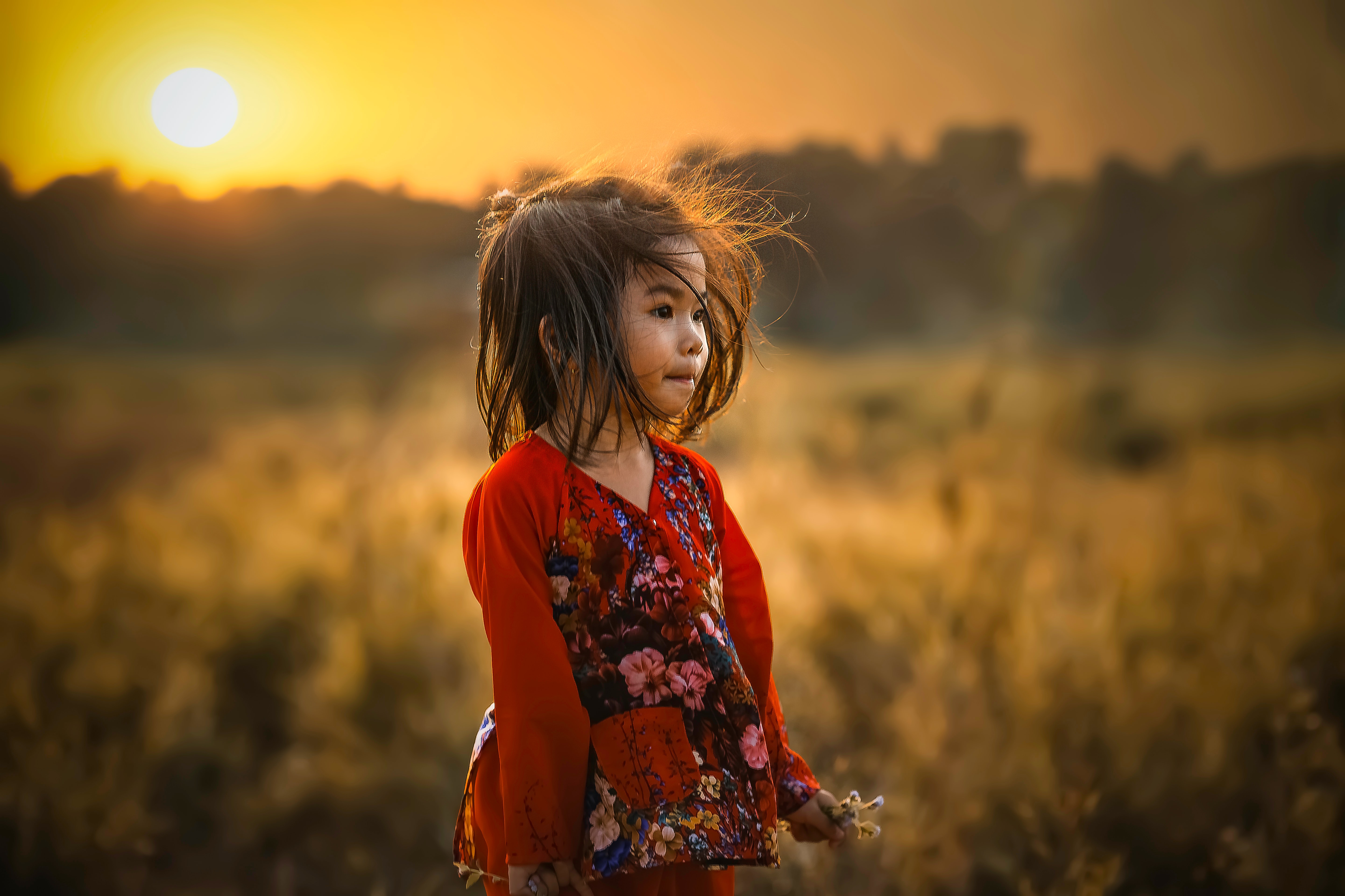 A girl in a field.