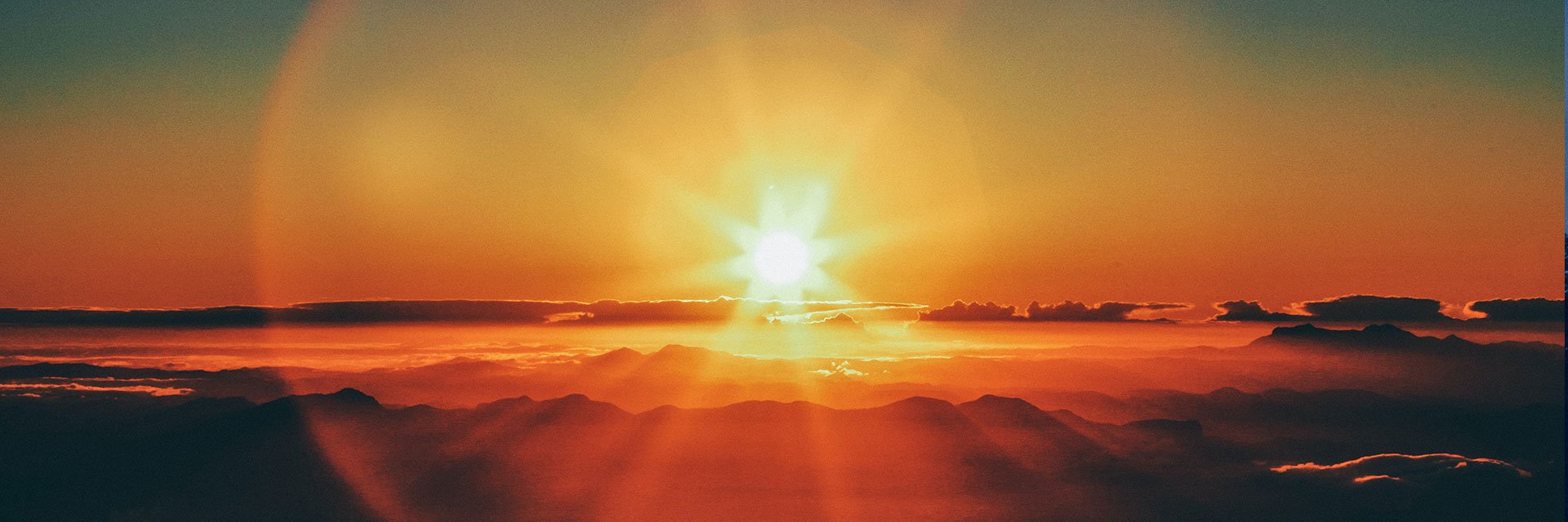 Photographer: Jonathan Borba
Agency: Unsplash The sun is setting over the clouds.