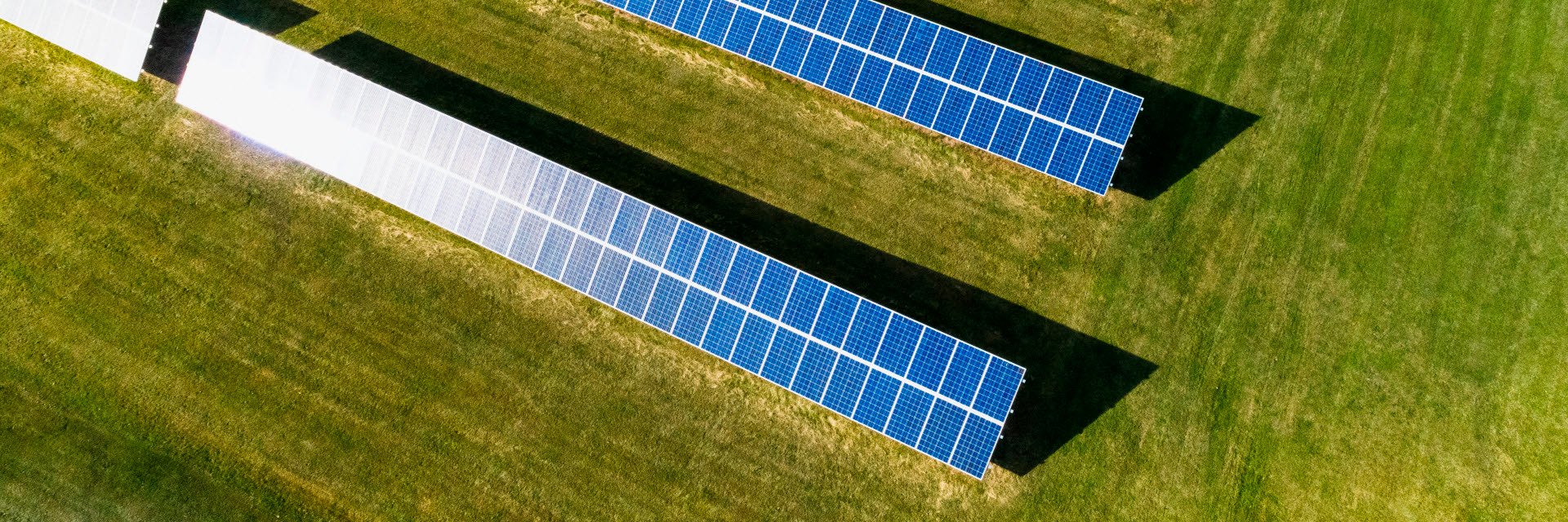 Photographer: Hans Berggren
Agency: Johnér Rows of solar panels in a meadow, Österåker, Stockholm.